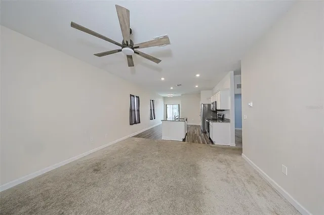 a view of a kitchen with a sink