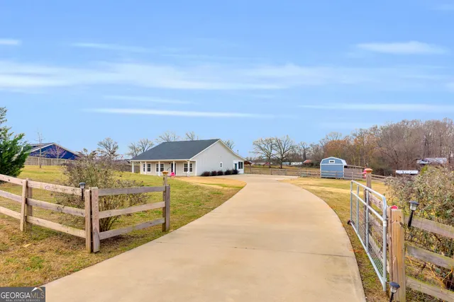 a view of a street with an ocean view