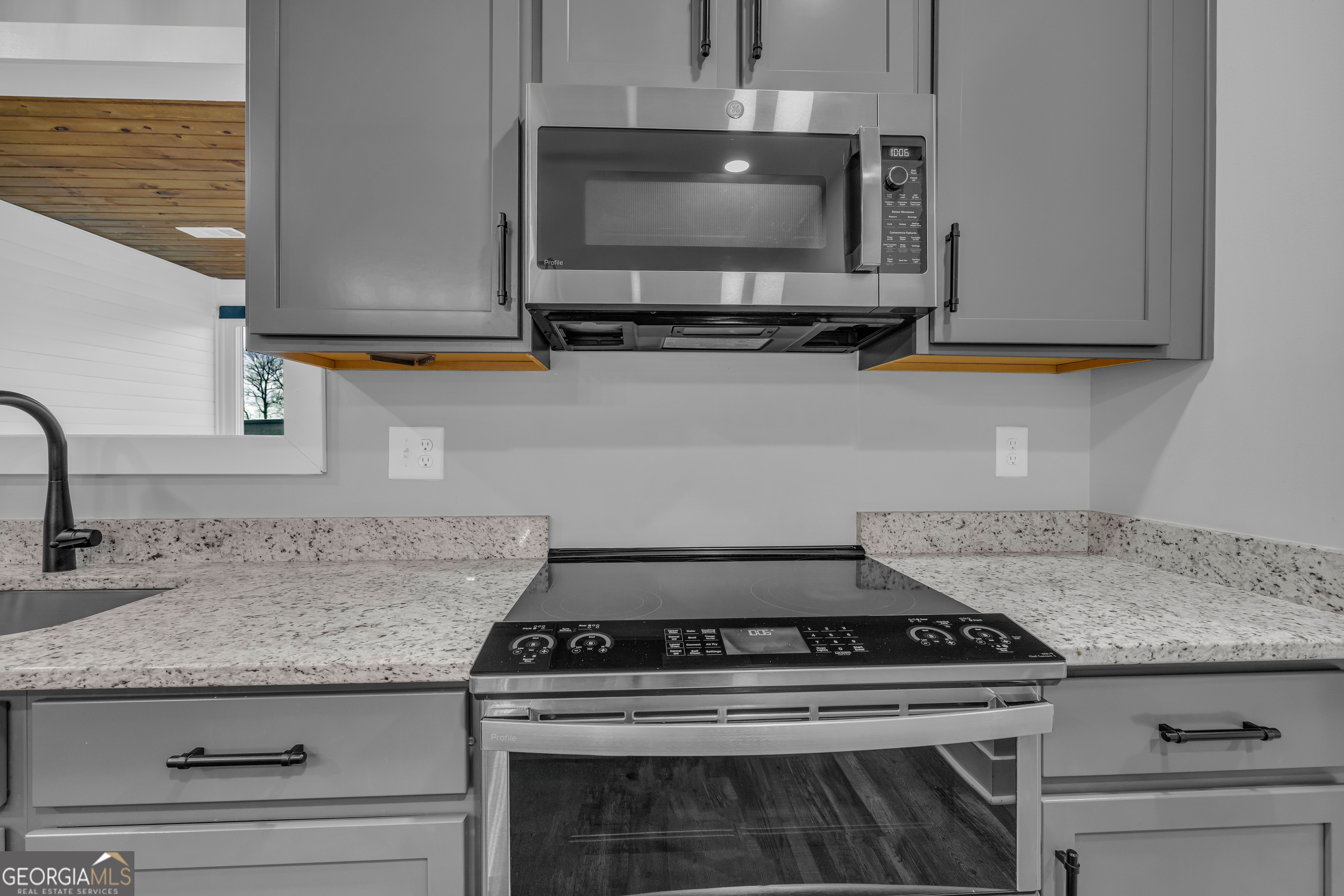 5177 Sandy Cross Road Carnesville, GA 30521 - Photo 41 of 86 a stove top oven sitting inside of a kitchen