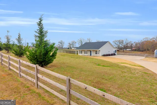 a view of a swimming pool with an ocean view
