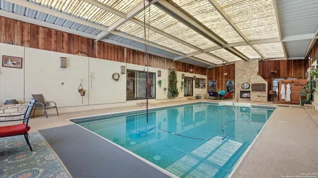 a view of a living room with a swimming pool