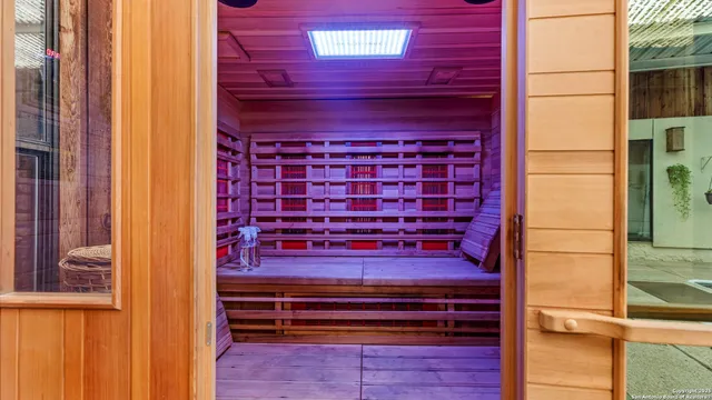 a view of sitting area with wooden walls