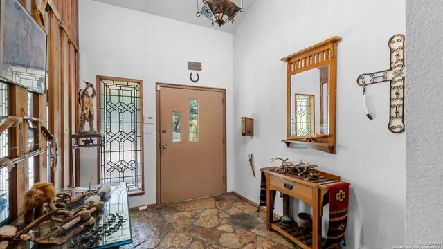 a view of a storage & utility room with a window