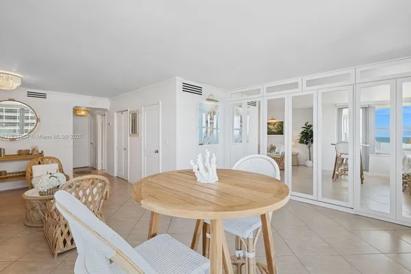 a dining room with furniture and a table