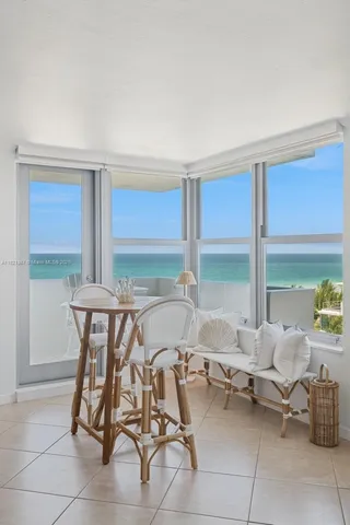 a room with furniture and a large window