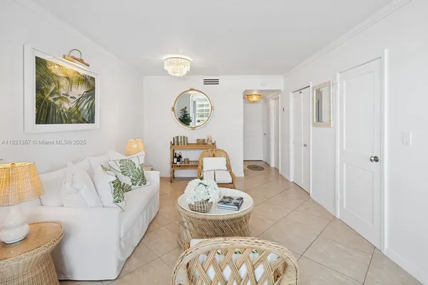 a living room with furniture and a table