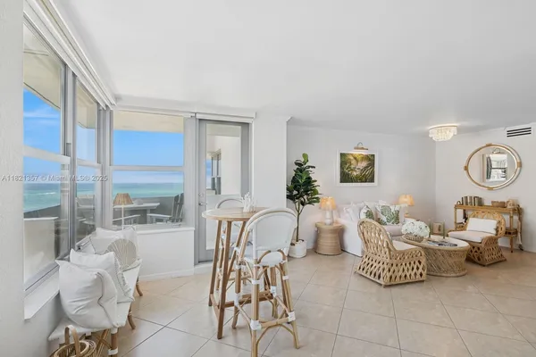 a living room with furniture and a window