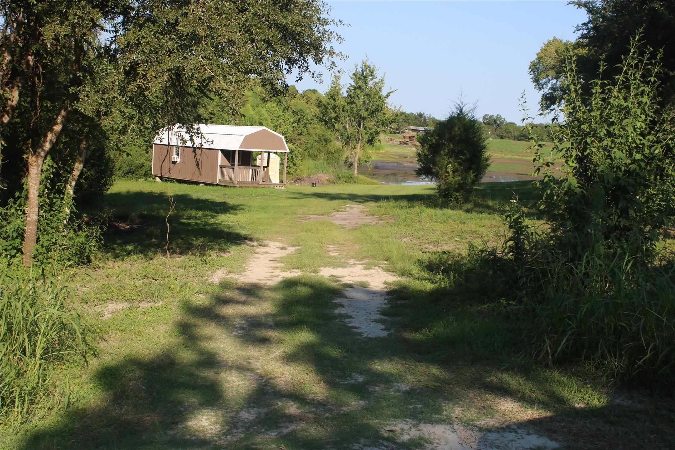 25302 Lk Rdg Drive Navasota, TX 77868 - Photo 3 of 17 a view of a house with a yard