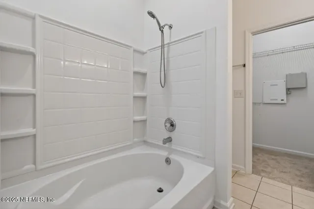 a bathroom with a bathtub