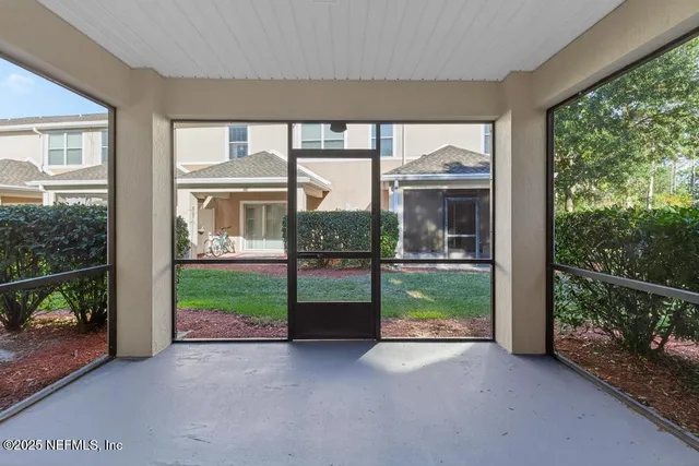 a view of a garden from a windows room