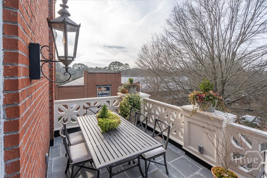 262 West Washington Street Madison, GA 30650 - Photo 13 of 69 Open up the double doors and carry the fun outdoors to the main balcony