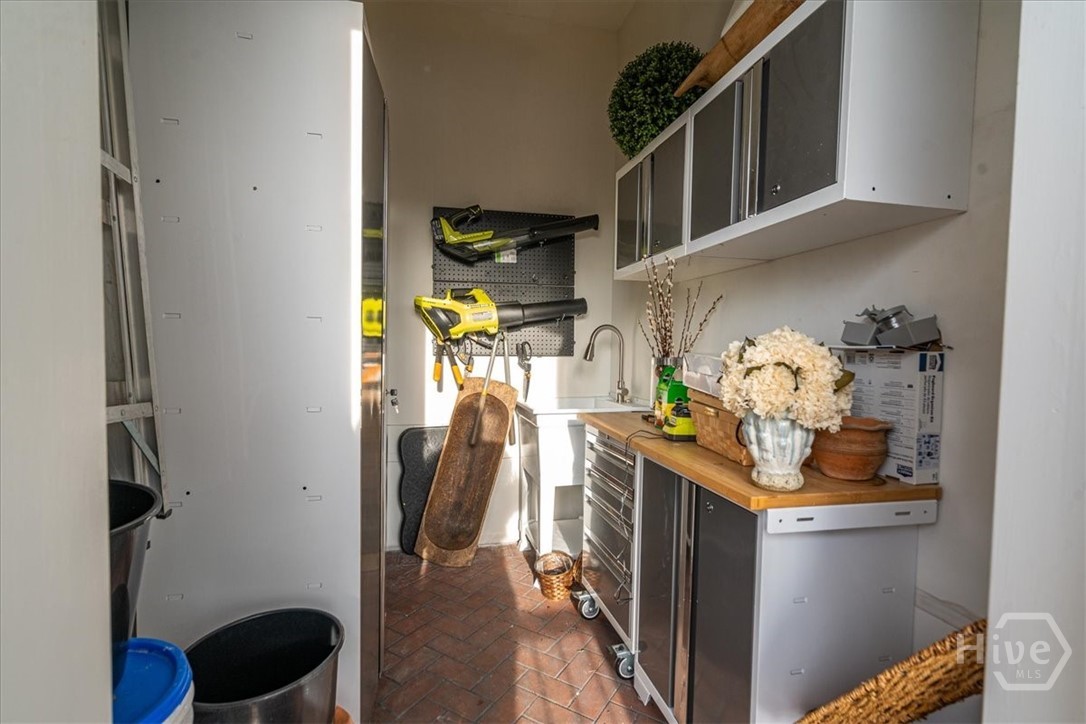 262 West Washington Street Madison, GA 30650 - Photo 56 of 69 Gardening Closet off one of the balconys