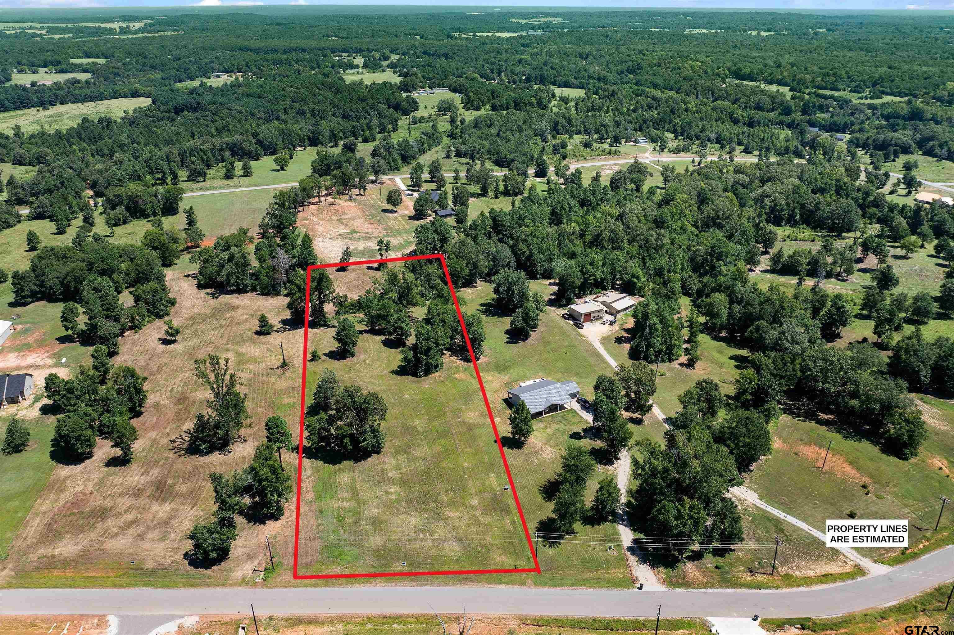 16864 Ridgeline Loop Winona, TX 75792 - Photo 5 of 9 an aerial view of residential houses with outdoor space