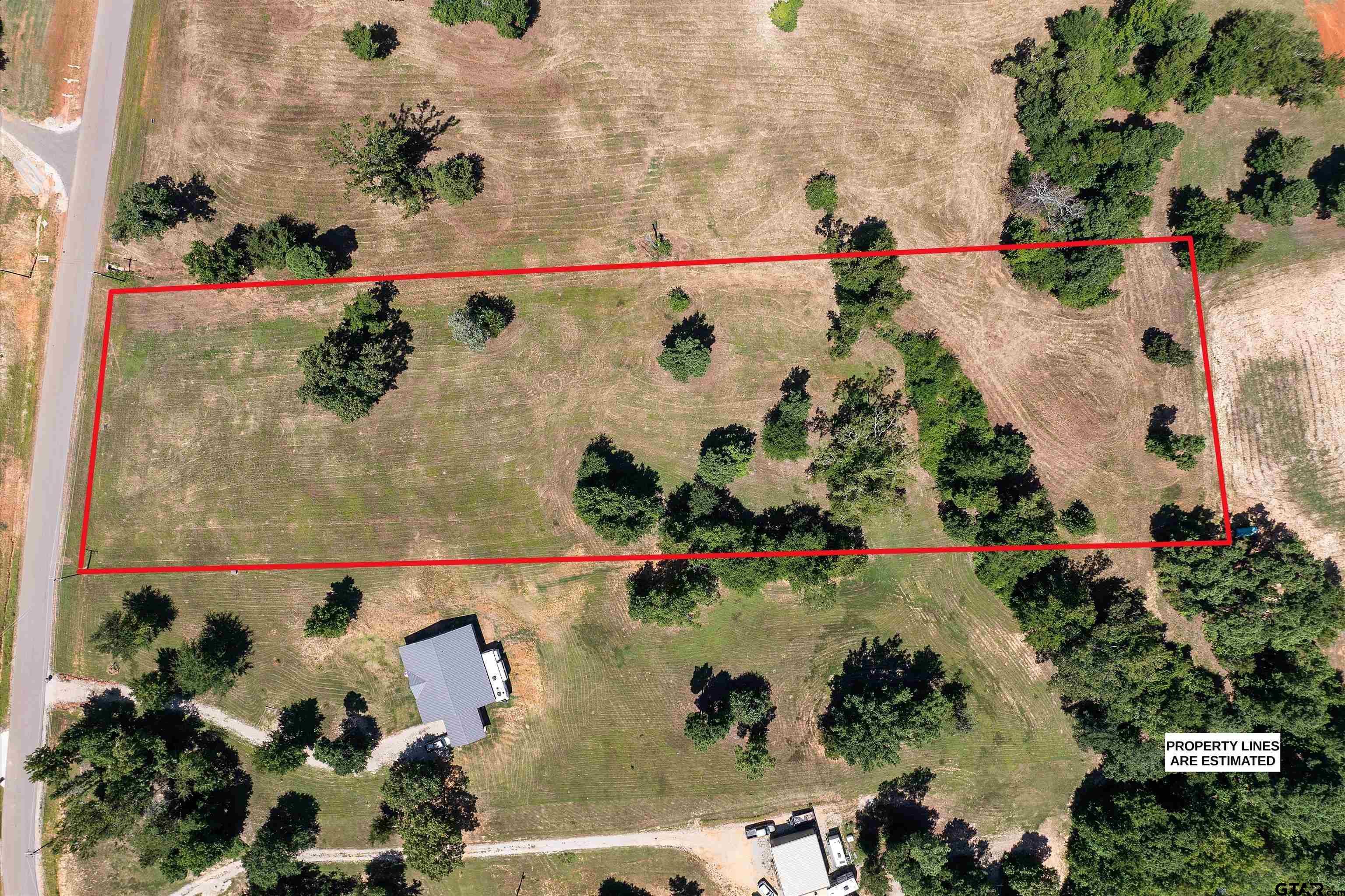 16864 Ridgeline Loop Winona, TX 75792 - Photo 7 of 9 an aerial view of a house