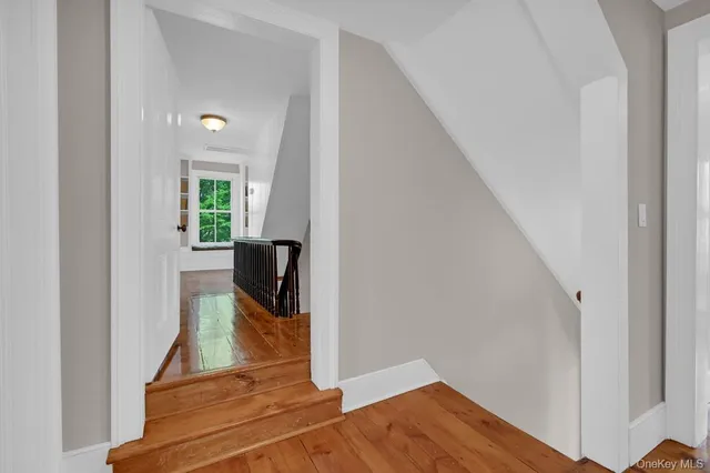 a view of hallway with livingroom and hallway