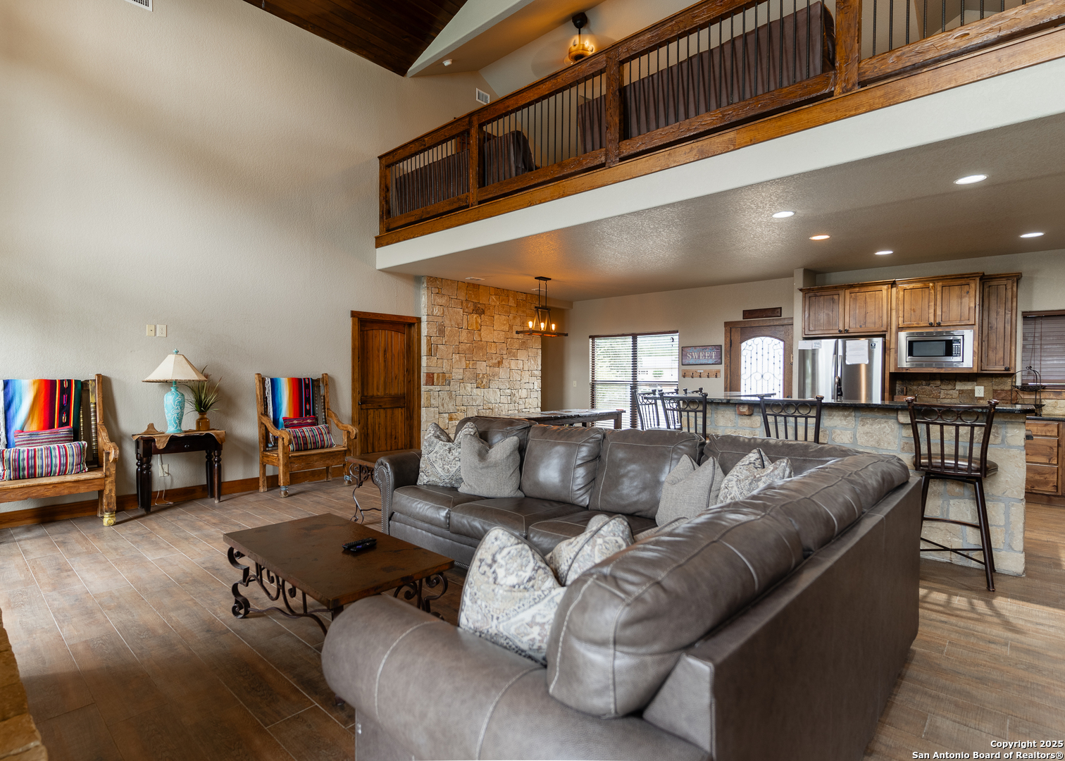 24 Morning Dew Concan, TX 78838 - Photo 15 of 88 a living room with furniture and a flat screen tv