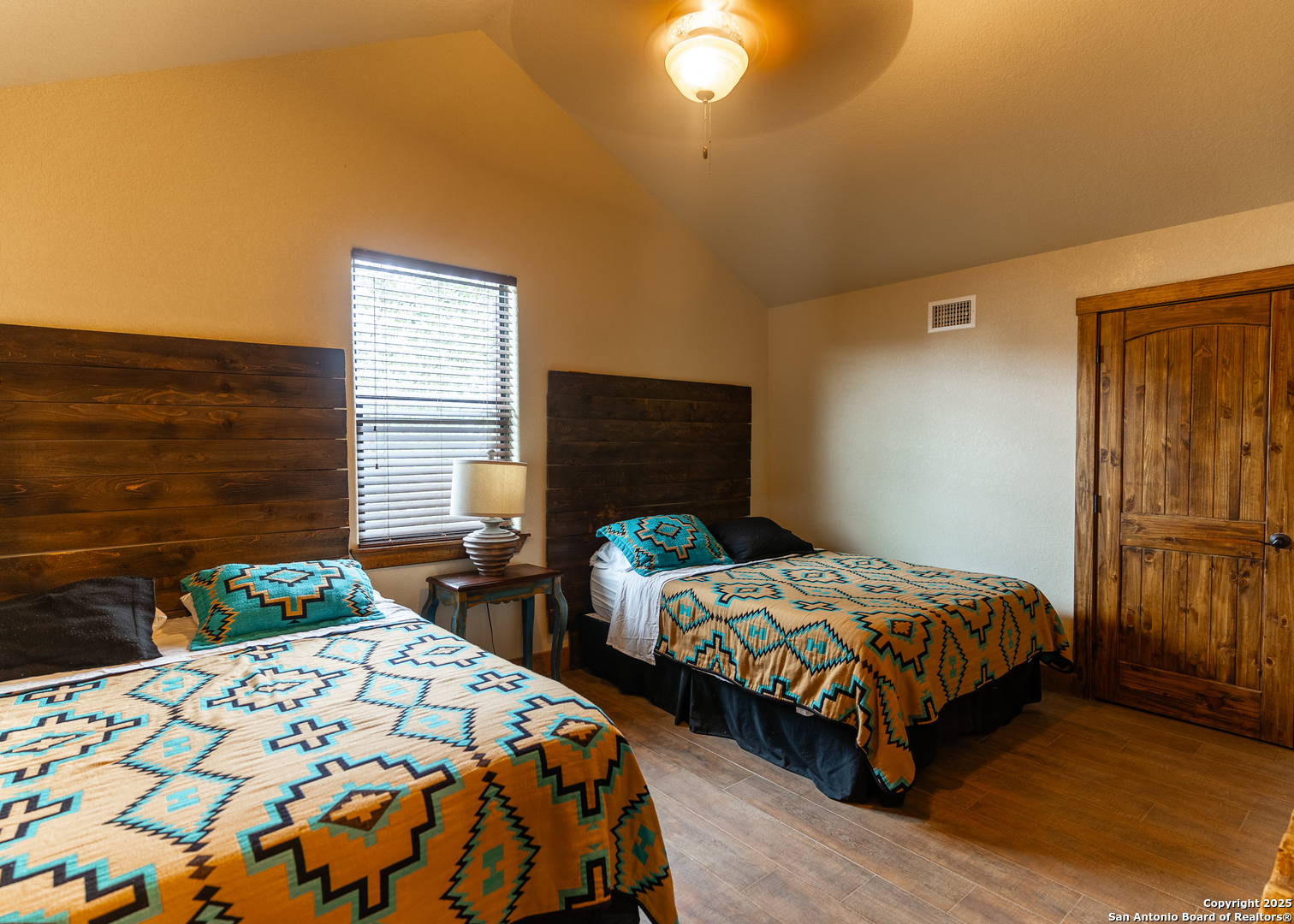 24 Morning Dew Concan, TX 78838 - Photo 23 of 88 a bedroom with two beds and a dresser