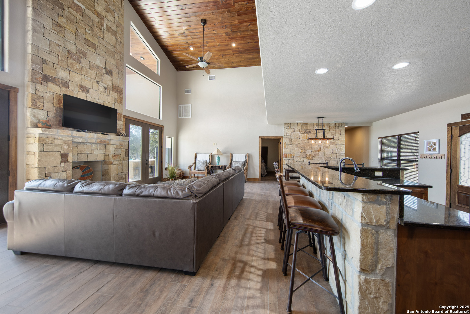 24 Morning Dew Concan, TX 78838 - Photo 75 of 88 a living room with furniture a flat screen tv and a fireplace
