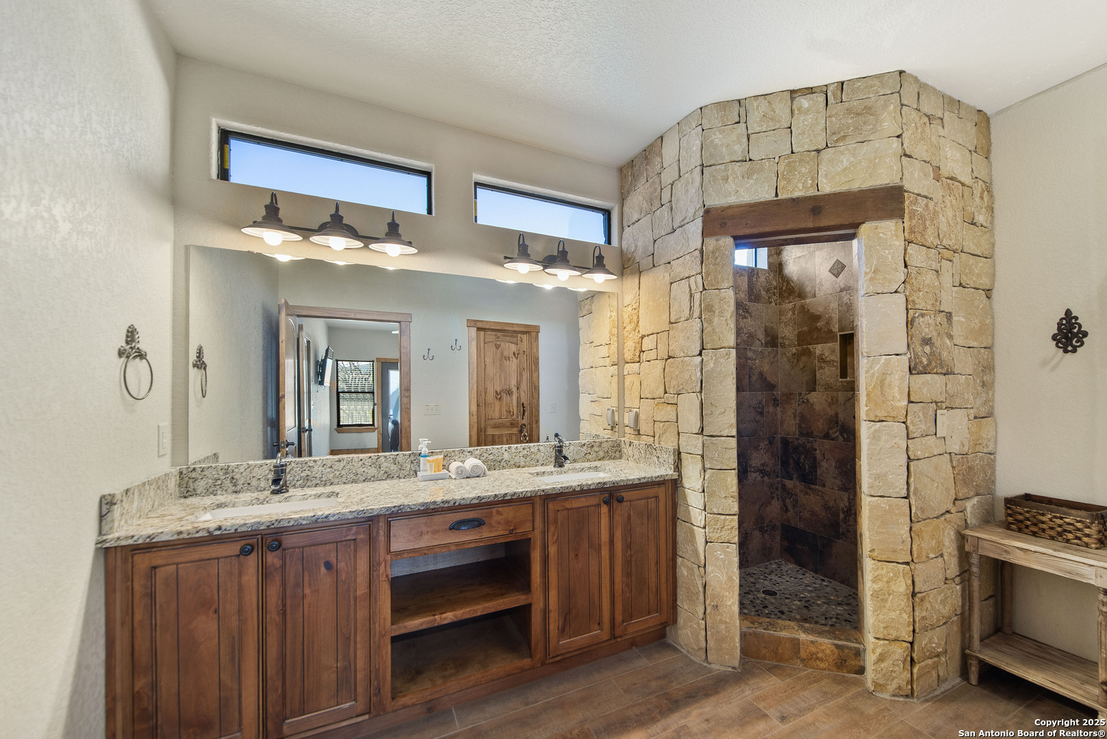 24 Morning Dew Concan, TX 78838 - Photo 83 of 88 a bathroom with a granite countertop sink mirror and shower