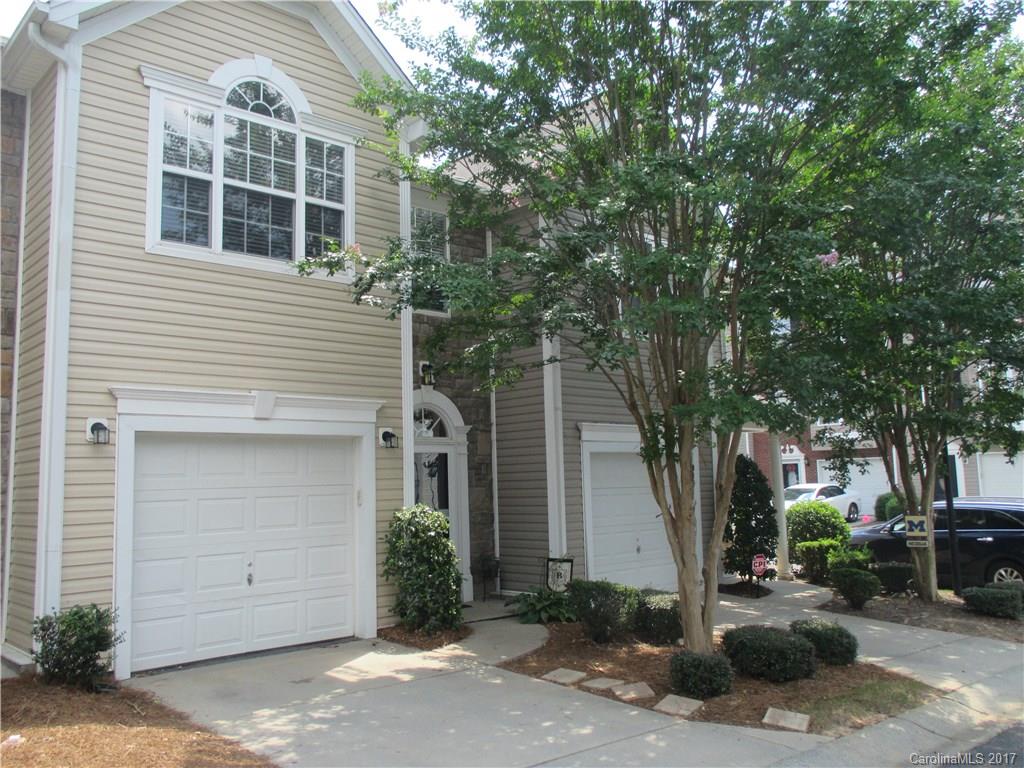 2147 Midnight Blue Lane, Unit 181 Fort Mill, SC 29708 - Photo 1 of 21 a front view of a house with a yard