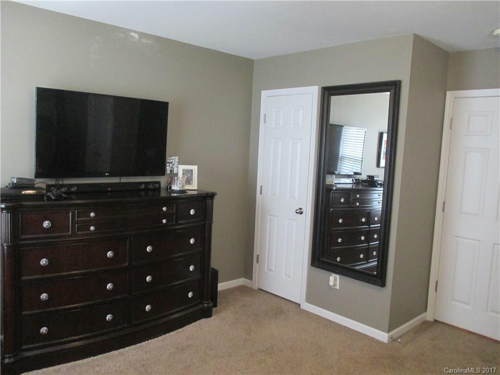 2147 Midnight Blue Lane, Unit 181 Fort Mill, SC 29708 - Photo 11 of 21 a room with furniture and flat screen tv