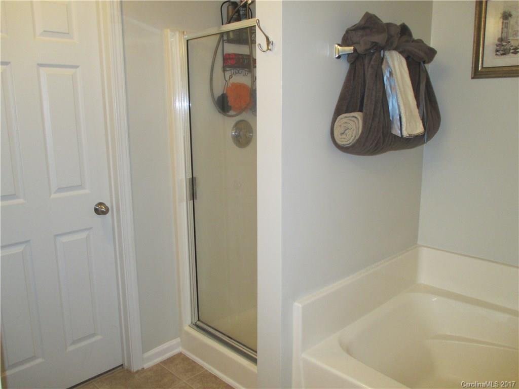 2147 Midnight Blue Lane, Unit 181 Fort Mill, SC 29708 - Photo 14 of 21 a bathroom with a shower
