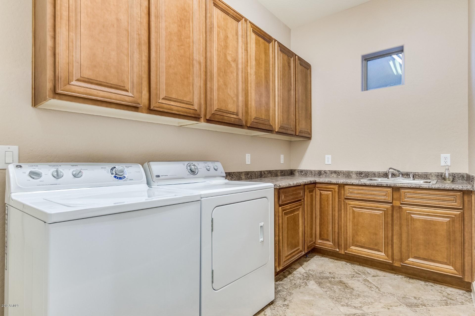 18122 West Narramore Road Goodyear, AZ 85338 - Photo 29 of 67 Large Laundry room