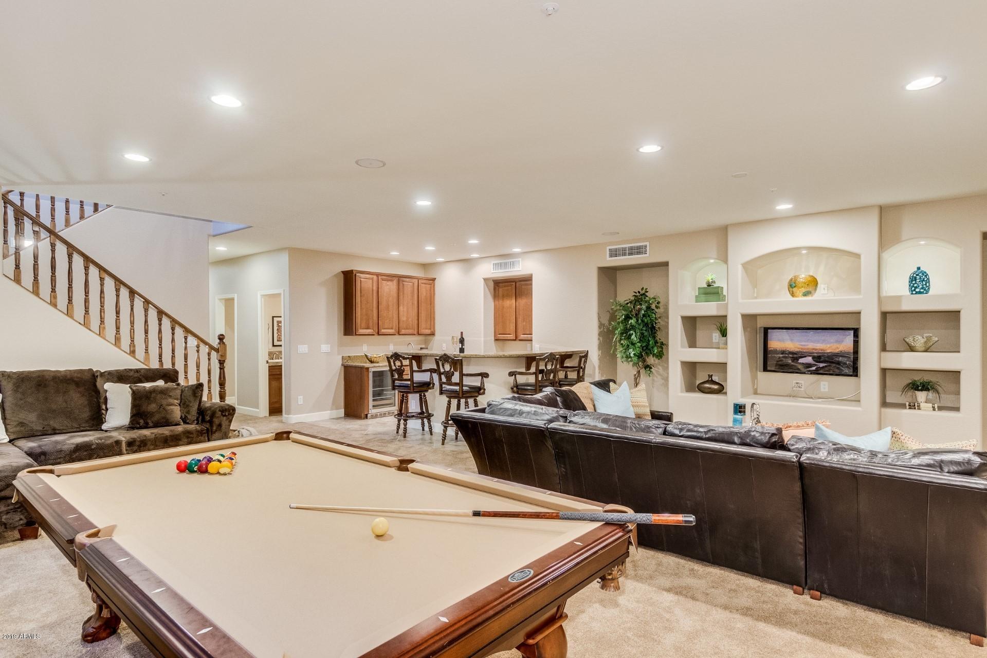 18122 West Narramore Road Goodyear, AZ 85338 - Photo 33 of 67 Spacious Entertaining Area & Bar