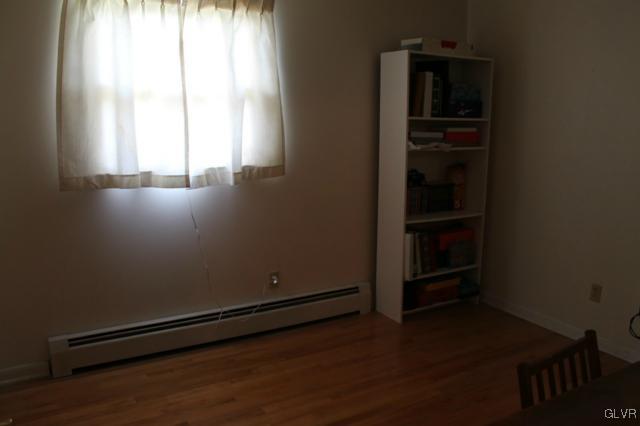 459 Nolf Road Nazareth, PA 18064 - Photo 16 of 23 an empty room with wooden floor and windows