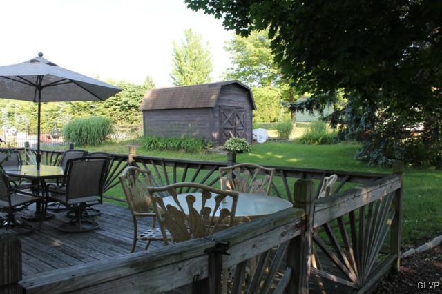 459 Nolf Road Nazareth, PA 18064 - Photo 20 of 23 a view of deck with furniture and umbrella