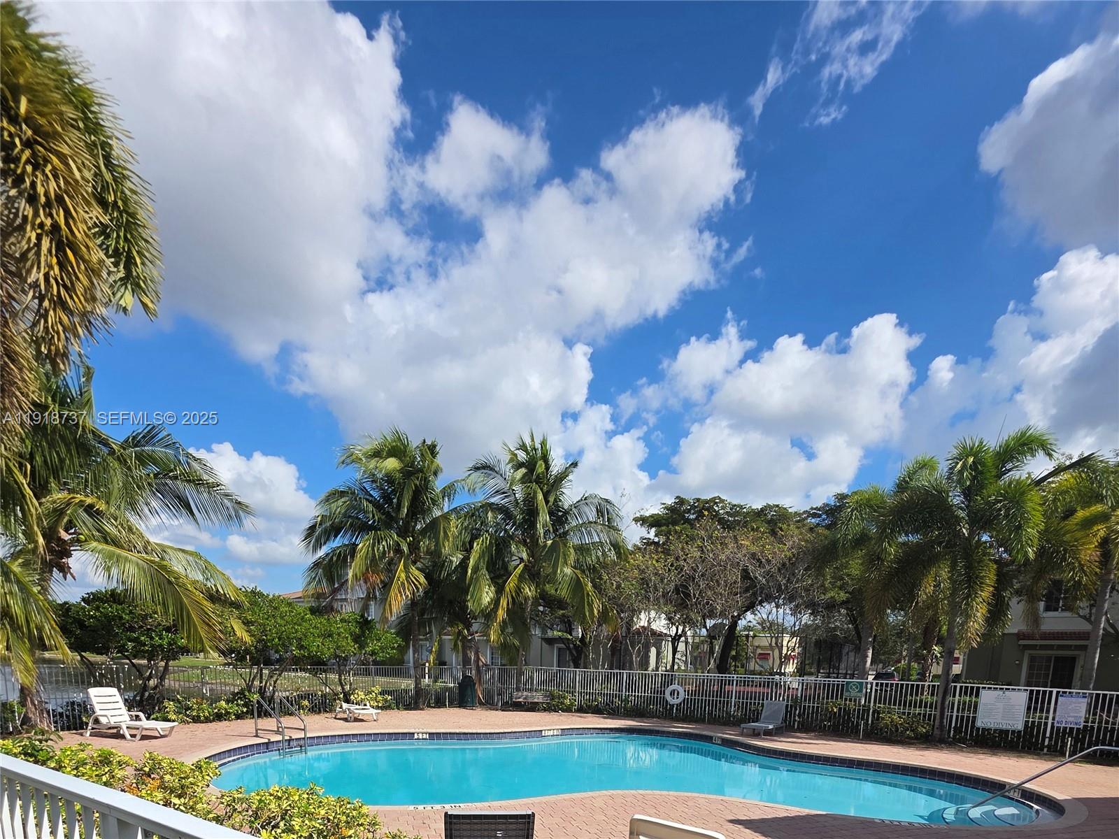 a view of a swimming pool and lake view