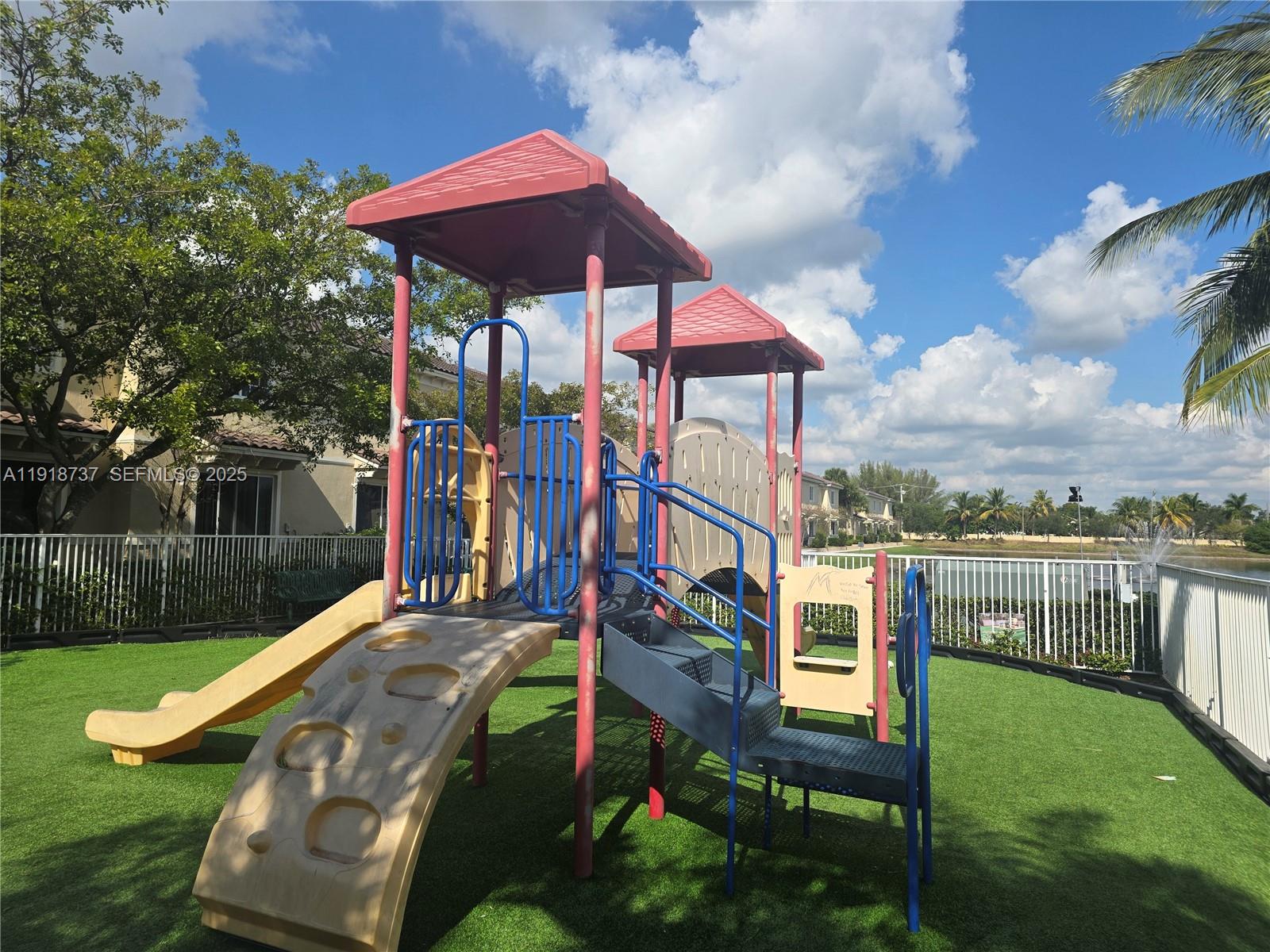 2612 Southwest 81st Terrace, Unit 206 Miramar, FL 33025 - Photo 34 of 40 a view of a house with a yard