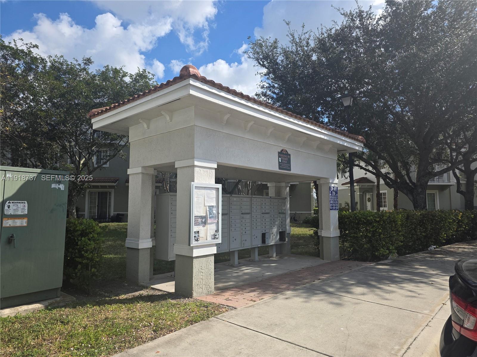 2612 Southwest 81st Terrace, Unit 206 Miramar, FL 33025 - Photo 39 of 40 a view of a house with a yard