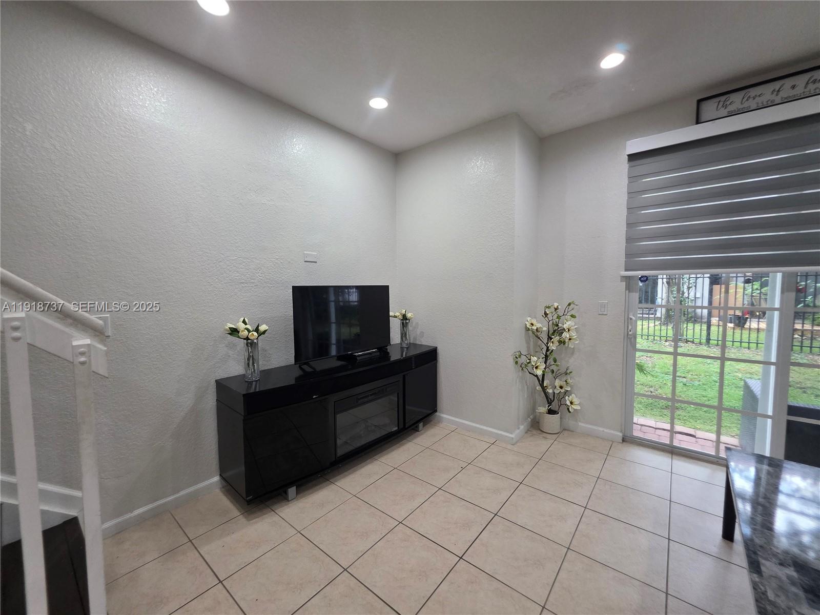 2612 Southwest 81st Terrace, Unit 206 Miramar, FL 33025 - Photo 10 of 40 a living room with furniture