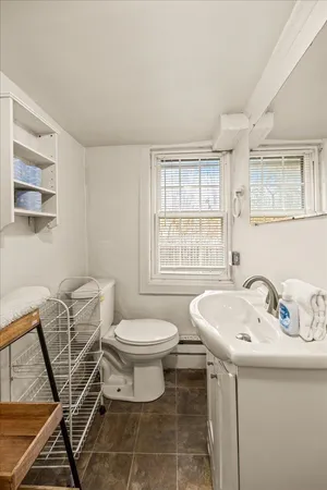 a bathroom with a sink and a toilet