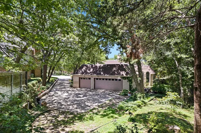 a front view of a house with yard