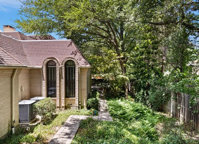 a view of a street with some trees