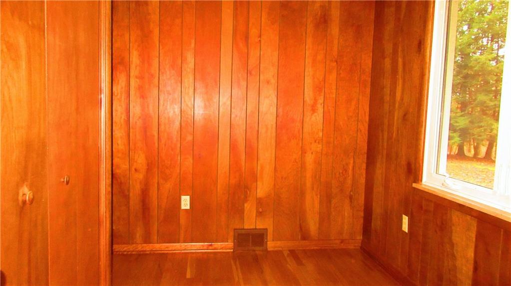208 Steppland Road Butler, PA 16002 - Photo 14 of 25 Third bedroom with hardwood floors and a large window overlooking the back yard.