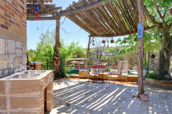 a view of a swimming pool with a patio