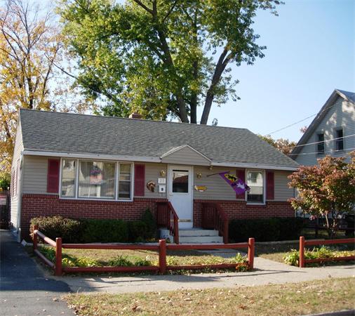 22 Santa Barbara Street Springfield, MA 01104 - Photo 1 of 23 front view of house with a yard