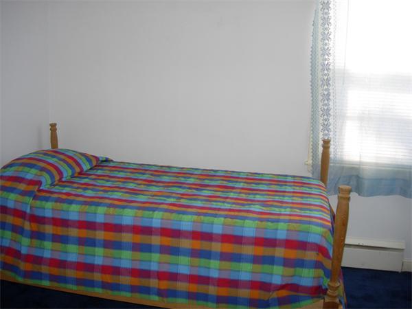 22 Santa Barbara Street Springfield, MA 01104 - Photo 15 of 23 a room with a bed and toys