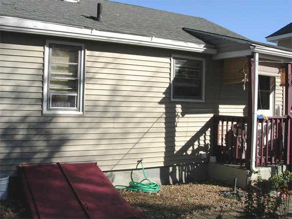 22 Santa Barbara Street Springfield, MA 01104 - Photo 23 of 23 a view of backyard with seating space and wooden fence