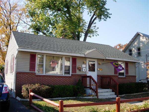 22 Santa Barbara Street Springfield, MA 01104 - Photo 3 of 23 a front view of a house with garden