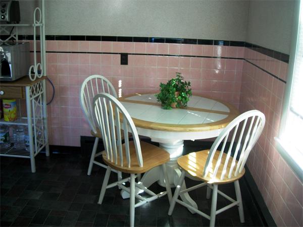 22 Santa Barbara Street Springfield, MA 01104 - Photo 5 of 23 a view of a dining room with furniture and wooden floor