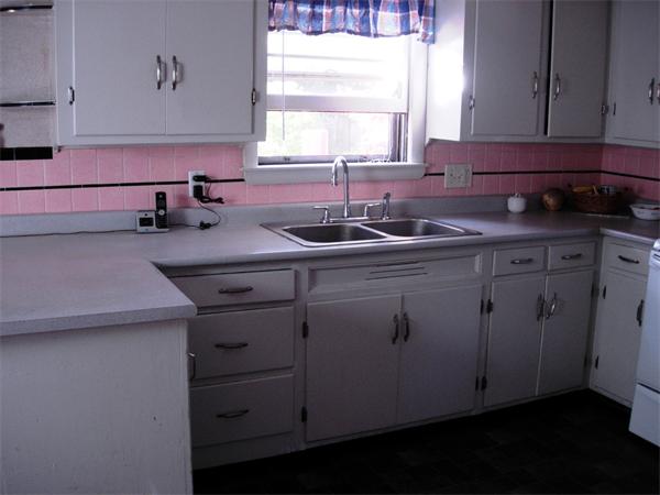 22 Santa Barbara Street Springfield, MA 01104 - Photo 7 of 23 a kitchen with cabinets appliances a sink and a window