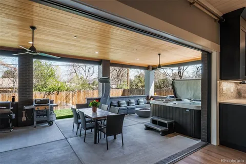 a bedroom with a bed a lamp and a window