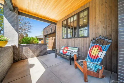 a workspace with furniture and a potted plant