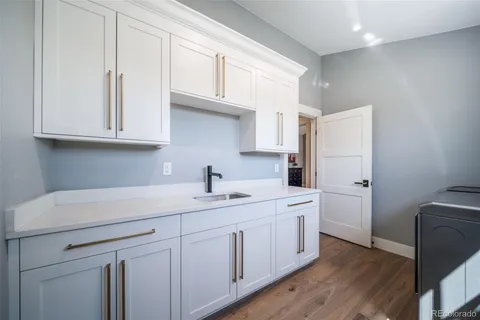 a view of entryway with stairs and wooden floor