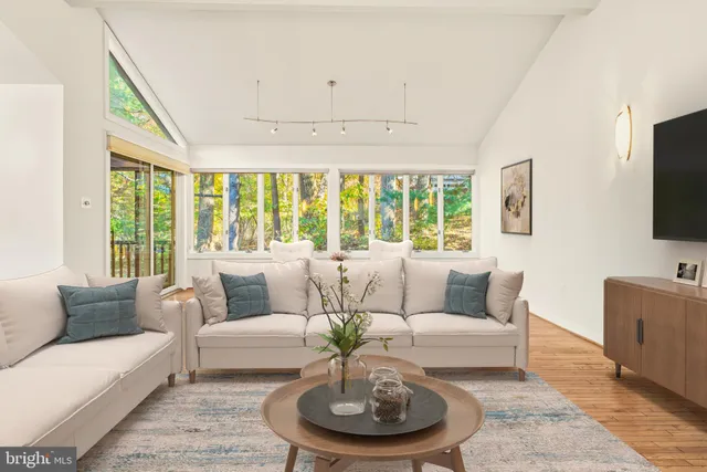 a view of a a dining room with furniture window and outside view
