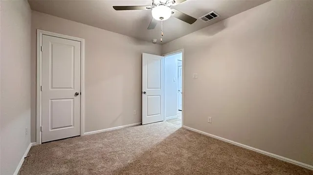 en empty room with windows